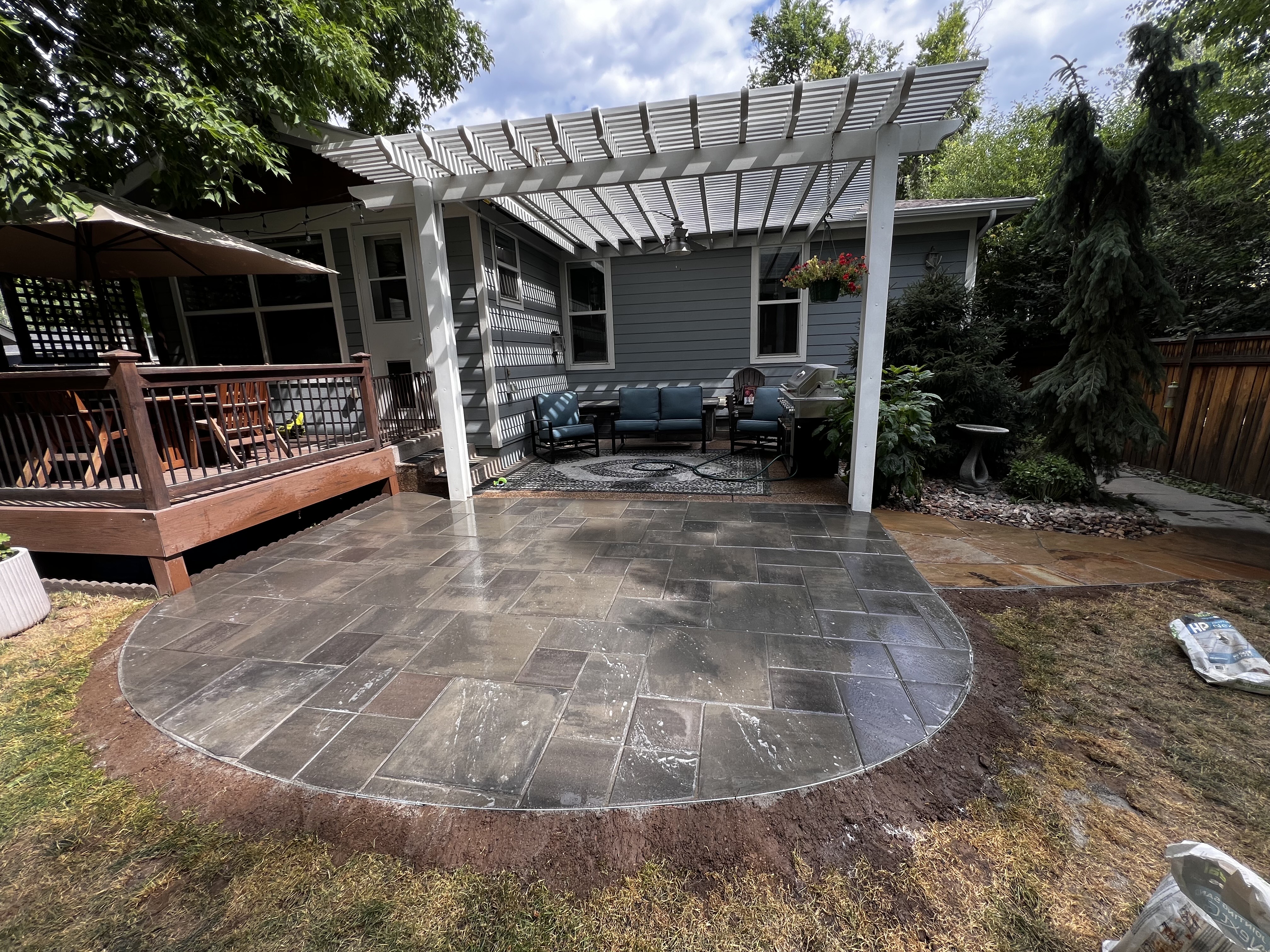 Beautiful patio and pergola installation by Flora Landscaping in Northern Colorado
